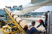 Loading cargo in the cabin of Korean Air's B-777/300ER aircraft converted for cargo operation