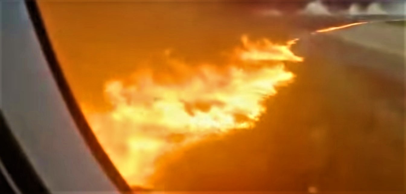 The SSJ-100 airplane of Aeroflot leaves tongues of fire on the runway of the Moscow-Sheremetyevo airport