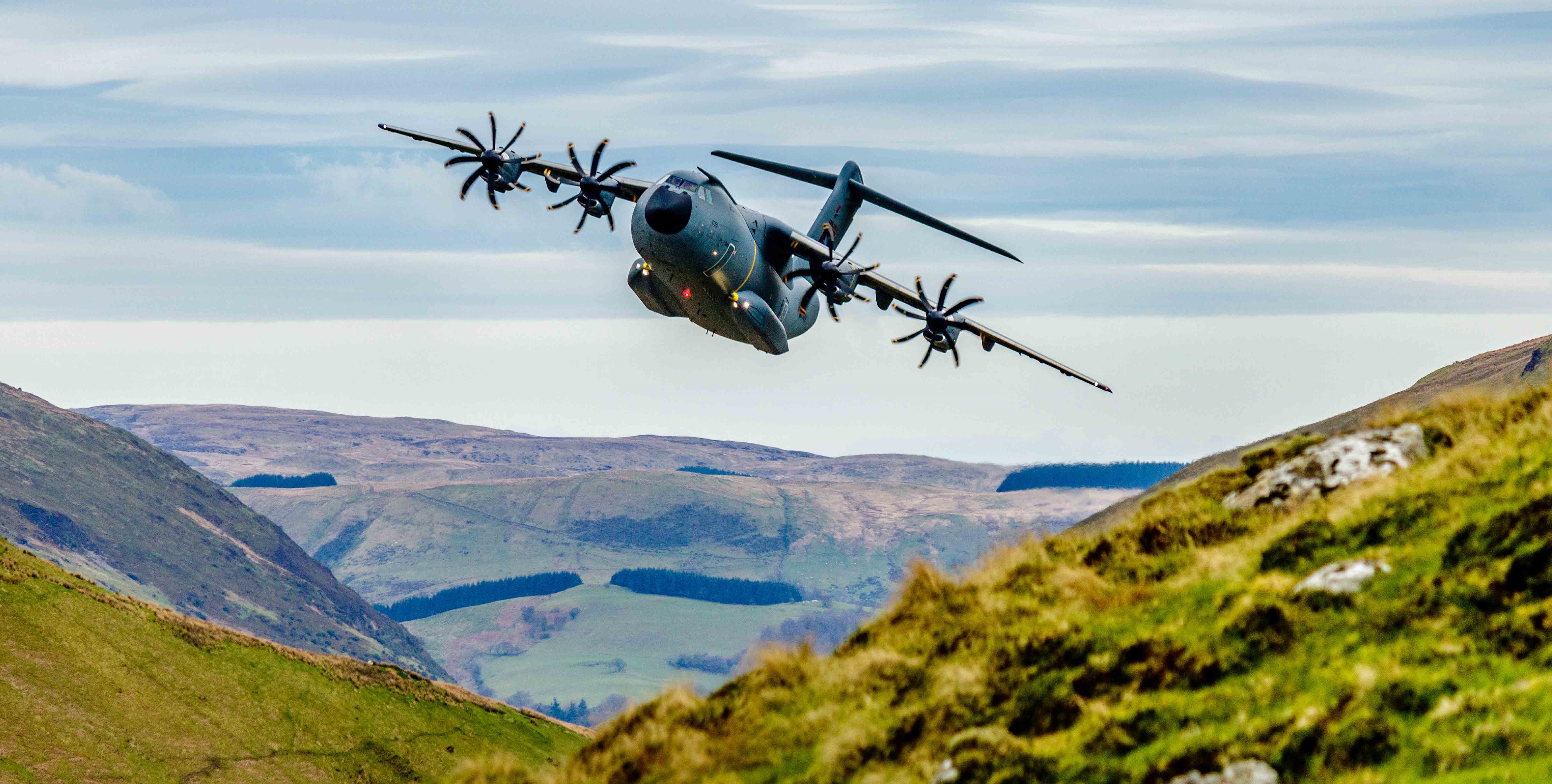 A RAF A-400M airplane performing low level flights in Wales, Mach Loop, in 2017