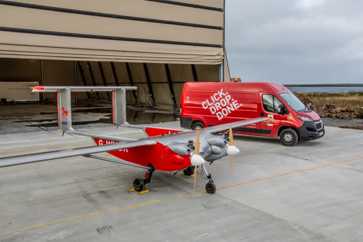 A drone and a van of the British postal company Royal Mail
