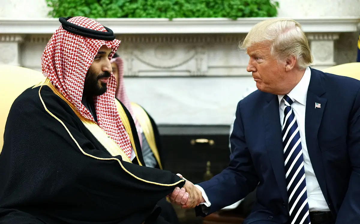 The US President Donald Trump shakes hands to the Saudi Prince Mohammed bin Salman