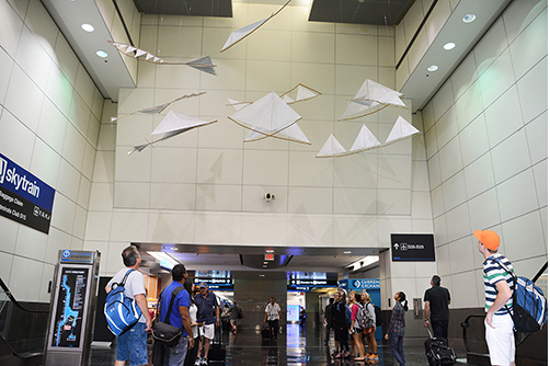 Flying kites at Miami Airport, under latest art installation, "Ando Volando"