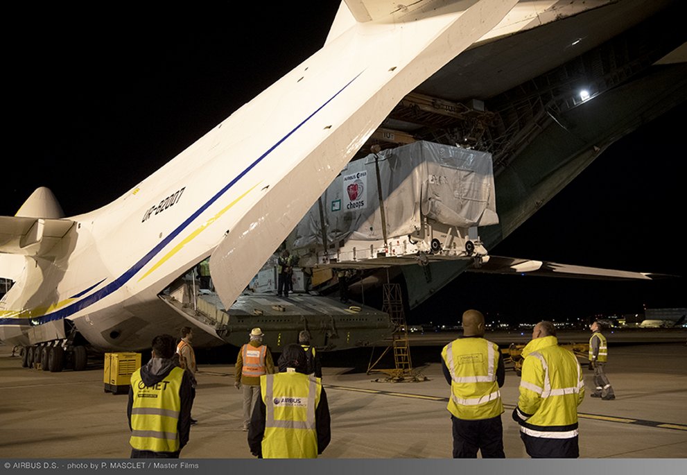 CHEOPS’ container loaded into the Antonov freighter, along with another Airbus satellite
