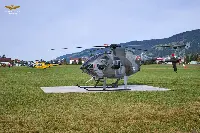 Elicottero AMI con il logo del centenario impegnato in una esercitazione