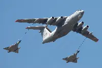 An Ilyushin Il-78 aircraft during an aerial refuelling to two Dassault Mirage 2000 fighter