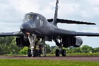 A Rockwell B-1B Lancer, a supersonic variable-sweep wing heavy bomber aircraft of USAF