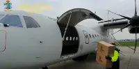 Roma, 26 marzo 2020. Aereo GdF all'aeroporto militare di Pratica di Mare carica materiale medico per emergenza epidemica coronavirus