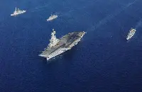 An aircraft carrier and ships of the French Navy