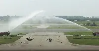 Water cannons salute two of India's 36 decommissioned MiG-21 Bison fighter aircraft during a ceremony in Chandigarh on September 26, 2025