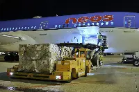 Aereo B-787/9 Dreamliner di Neos, proveniente da Pechino, atterrato la notte del 24 marzo 2020 a Milano-Malpensa per portare aiuti sanitari destinati al Dpc ed alla Cri