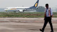 A Jet Airways aircraft in an airport